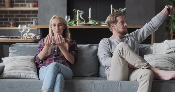 Modern Husband Wife Relaxing Posing Taking Selfie Watching Entertainment Video Show on Smartphone alt