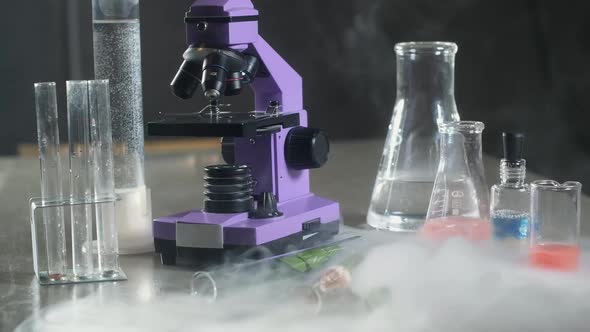 scientific laboratory. Nitrogen evaporates from test tubes and beakers. Cryogen. alt