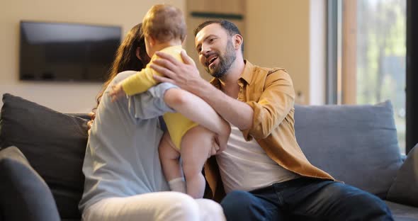 Happy Family with a Little Boy at Home alt