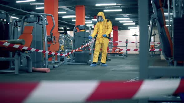 Fitness Center Is Getting Sanitized By a Disinfector alt