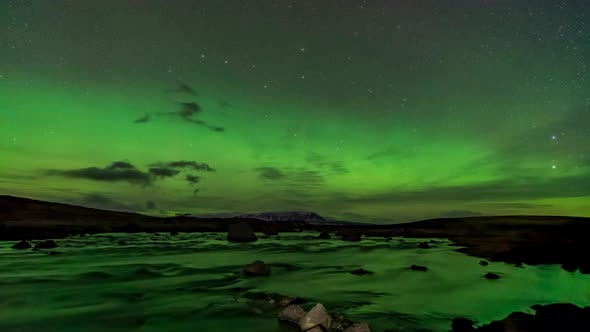 Green Northern Lights Over the River Time Lapse