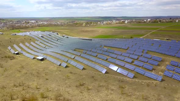 Solar Panels Farm (solar cell). Renewable green alternative energy concept - Aerial view