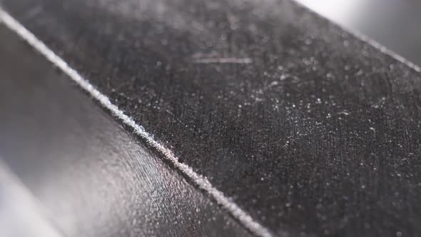 Close Up at the Surface of Processed and Polished Silver Bar at the Factory alt