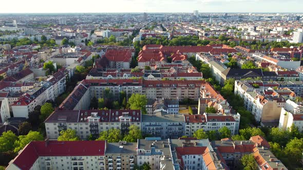 Typical more families apartment blocks in Berlin.Daring aerial view flight panorama overview drone alt