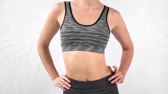 Closeup Flexible Lady Fit Model Abdominal Rotating Doing Aerobics Exercise at Pilates Class alt