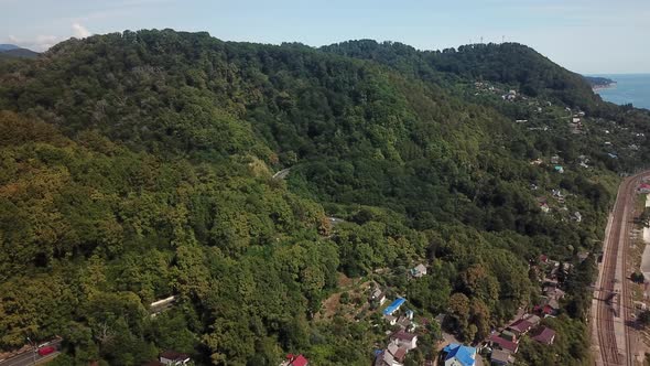 Aerial Curvy Road From the High Mountain Pass To Sochi, Russia alt