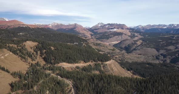 Rocky Mountains in Colorado with pine trees. Drone videoing down. alt