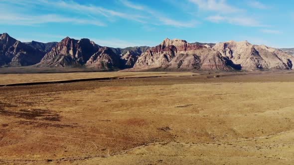 Aerial sweeping panoramic of Red Rock Canyon Park in Nevada alt