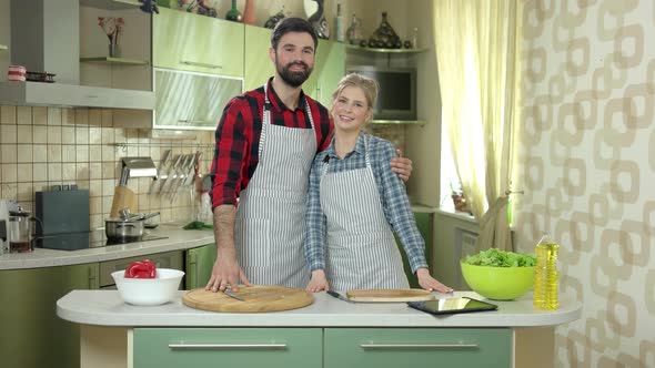 Man and Woman Smiling, Kitchen alt