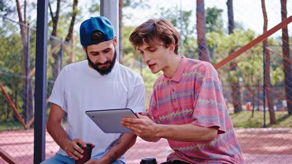 Closeup To the Camera Two Good Friends Guys in a alt