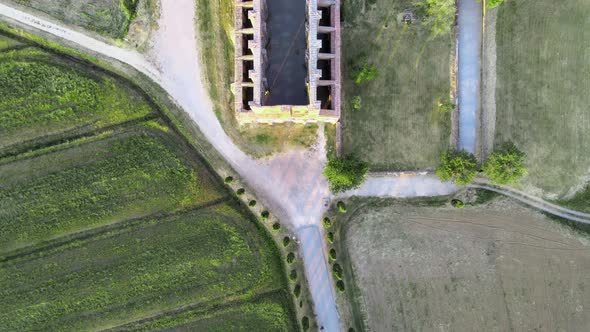 Amazing Aerial View of Beautiful San Galgano Abbey with Roofless Walls Tuscany Hills in Spring alt