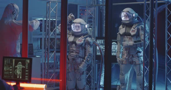 American Astronauts Testing Spacesuit alt