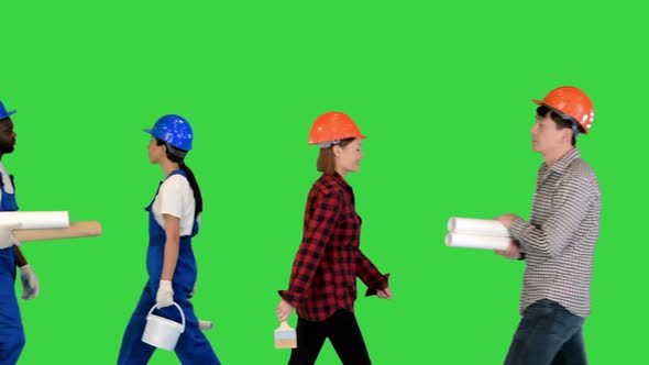 Many People in Different Professional Outfits Walking By on a Green Screen Chroma Key