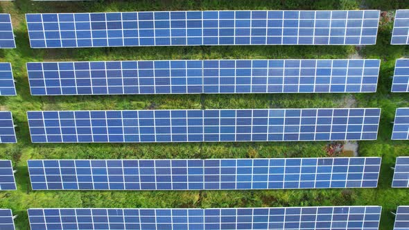 4K : Aerial view of a solar power station alt