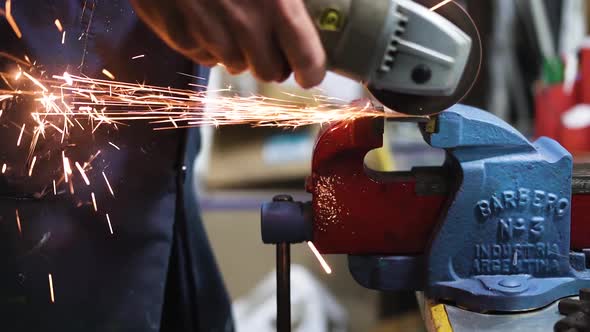 Worker Man Grinding And Making Sparks alt