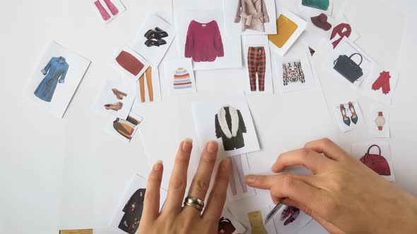 The Stylist Selects a Wardrobe Using the Example of Paper Decorations