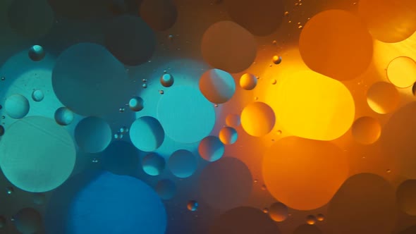 Oil Drops On A Water Surface Abstract Background