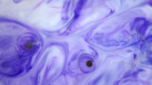 Ink in Water, Violet Ink Reacting in Water Creating Abstract Background