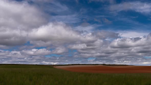 Green and Red Cultivated Lands Cloud Time Lapse