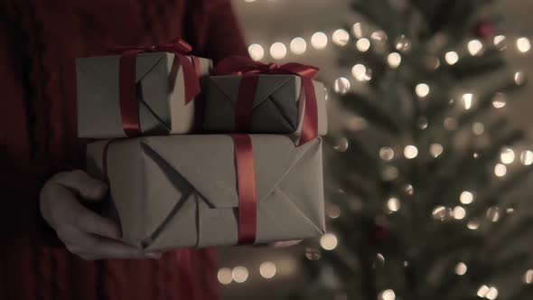 Walking Hold Christmas Gifts alt