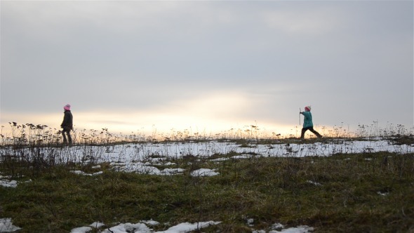 Children Walking Down a Hill 