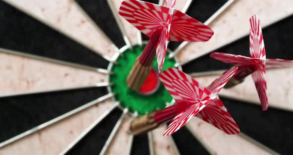 4K - Dart hits the bullseye. Dartboard defocused view alt