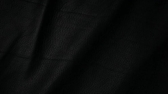 footage of dark leather background alt