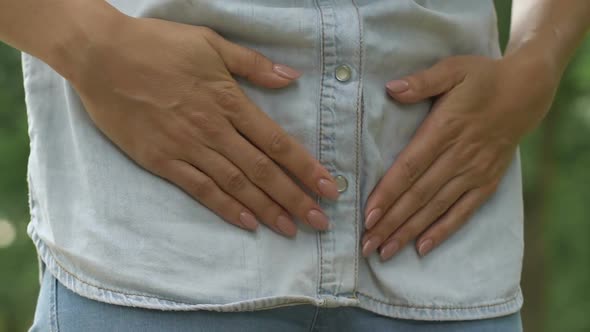 Female Suffering From Lower Abdominal Pain, Having Cystitis or Periods, Health alt