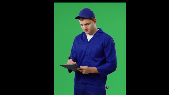 Handyman in blue overalls alt