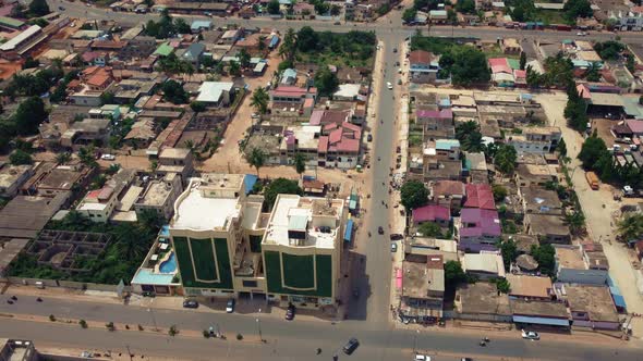 Cinematic Aerial View of African City traffic, showing Twin Towers ...