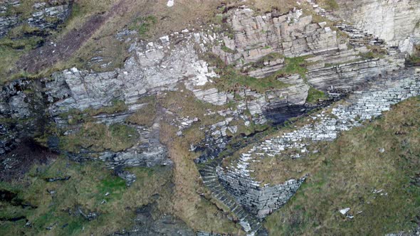 Drone top down shot looking at the man made steps Whaligoe cliffs in Scotland UK alt