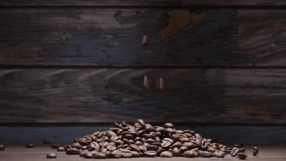 Coffee beans are scattered on the table.