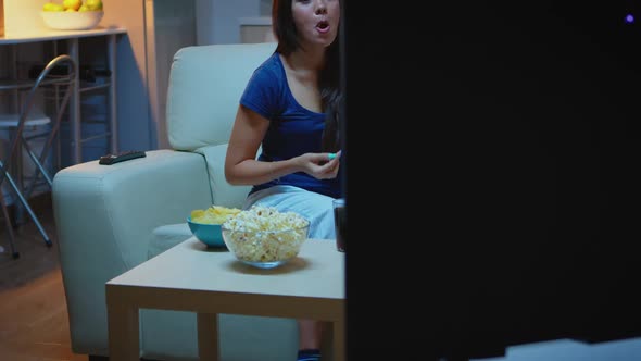 Housewife Relaxing at Comedy Tv Show alt