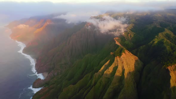 Dramatic Sunset View of Hawaiian Coastline and Pacific Ocean. Impressive Aerial Footage alt