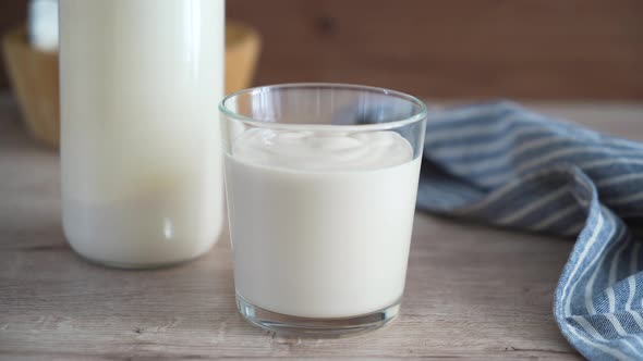 Homemade fermented baked milk. Traditional healthy drink ryazhenka or homemade yogurt alt