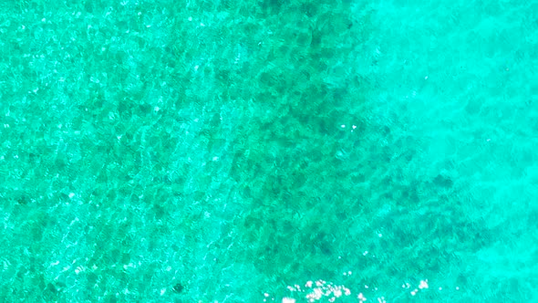 Sea Surface in a Turquoise Lagoon, Top View. Transparent Turquoise Sea Water, Natural Background alt