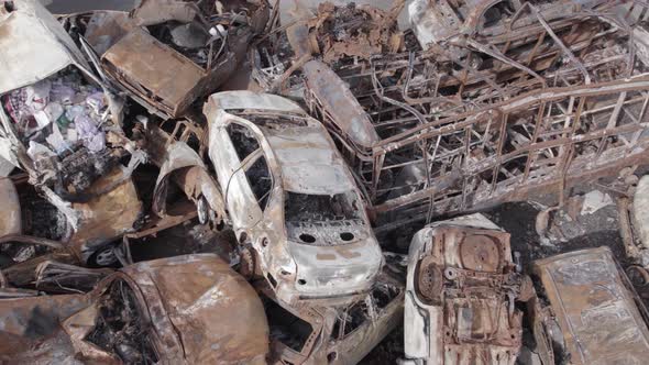War in Ukraine a Dump of Burned Cars in Irpin Bucha District alt