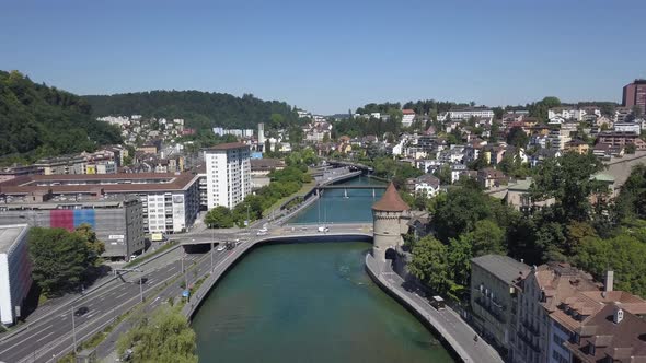 Switzerland. Modern Bridges and Buildings of Lucerne, Next To the Medieval Towers. alt