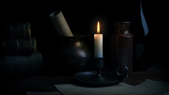 Historical Scene Of Candle And Books On Table alt