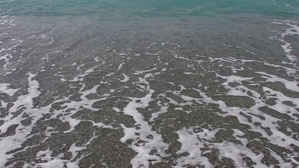 Sea Tide on a Pebble Shore