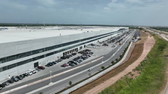 Tesla manufacturing facility in Austin, TX. Giga Texas in USA. American made cars by Elon Musk compa alt