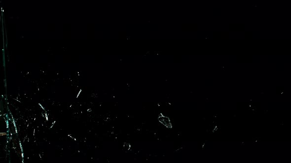 Real Glass Side Break in Super Slow Motion Isolated on Black Background, 1000Fps. alt