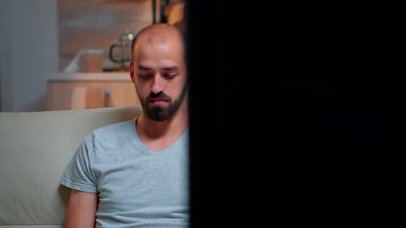 Focused Man Browsing on Internet Information for Deadline Project alt