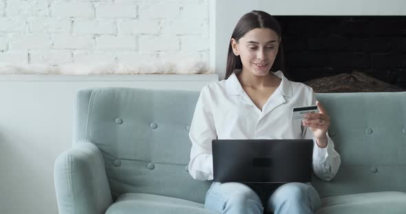 Young Woman Spending Money in Internet Websites and Stores and Making Online Payments alt