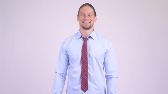 Happy Handsome Businessman Smiling and Laughing alt