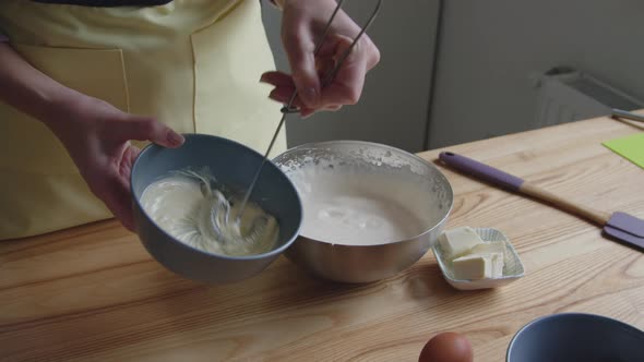 Woman Is Cooking Cream Mixing Butter