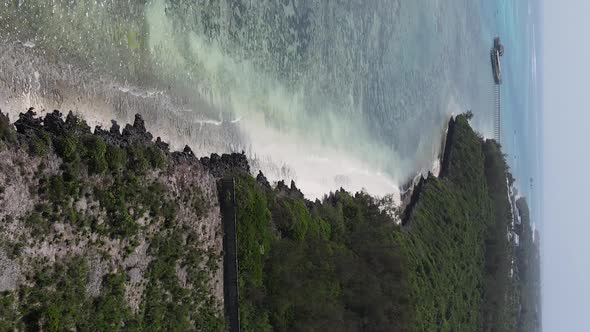 Vertical Video of the Ocean Near the Coast of Zanzibar Tanzania Aerial View alt
