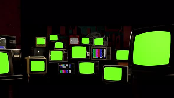 Two Clips in One. Retro TVs Turning On and Off Green Screens. 4K Resolution. alt