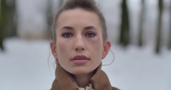 A Young Girl Stands Alone On The Street And Cries alt