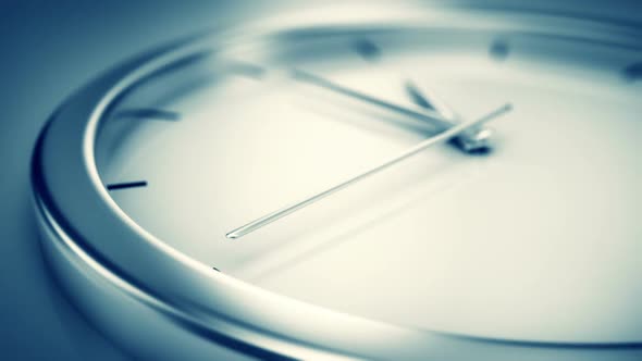 Zoom-out animation of a simple modern clock. Reminding that time is going on. HD alt